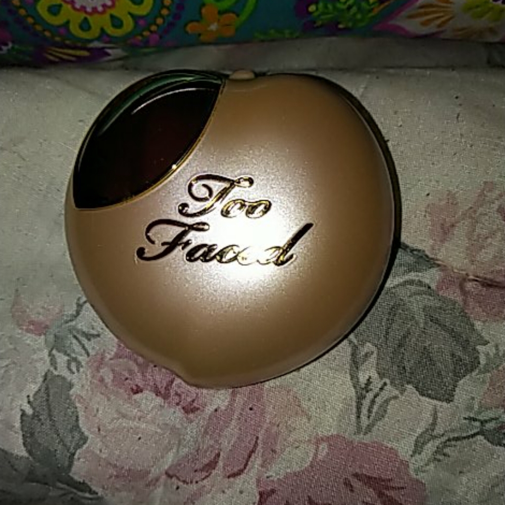 Too Faced Peach Frost Happy Face Melting Highlight